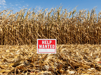 help wanted sign in a farm